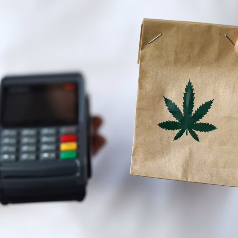 Payment card with a cannabis leaf